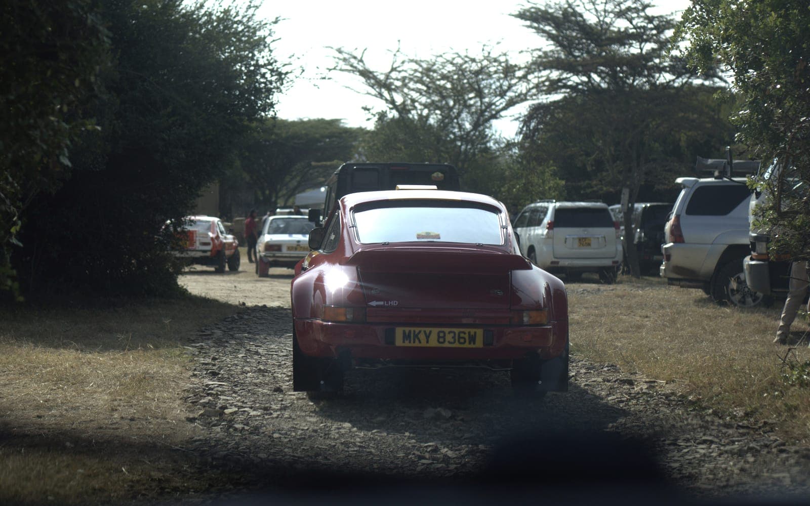 The Safari-prepared 911 among the support vehicles at the base on arrival day